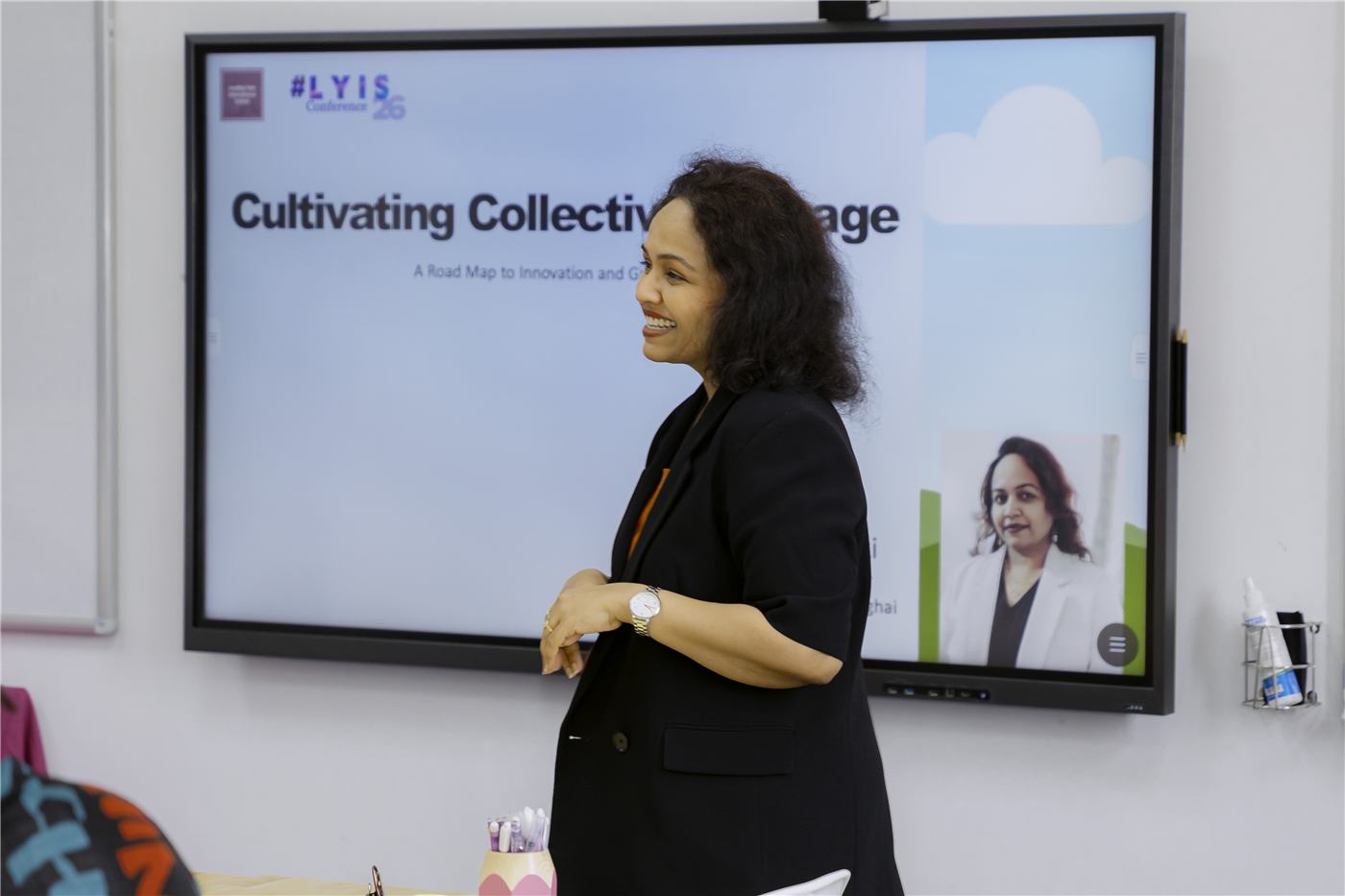 A presenter sharing research on cultivating collective courage